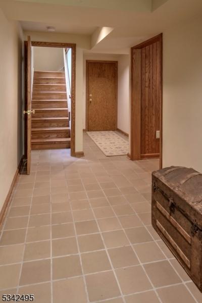 5 Apgar Way, Tewksbury Twp, NJ 08833 - hall with stairs and baseboards
