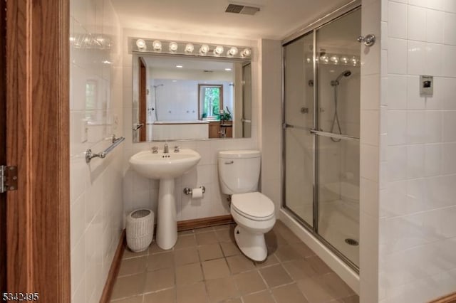 5 Apgar Way, Tewksbury Twp, NJ 08833 - full bathroom featuring toilet, a shower stall, tile walls, tile patterned floors, and a sink