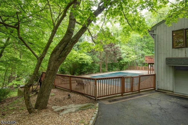 5 Apgar Way, Tewksbury Twp, NJ 08833 - swimming pool with a patio area and a forest view