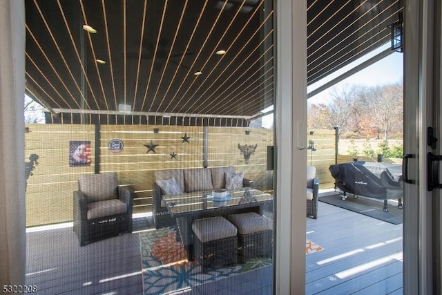 exterior space with a grill