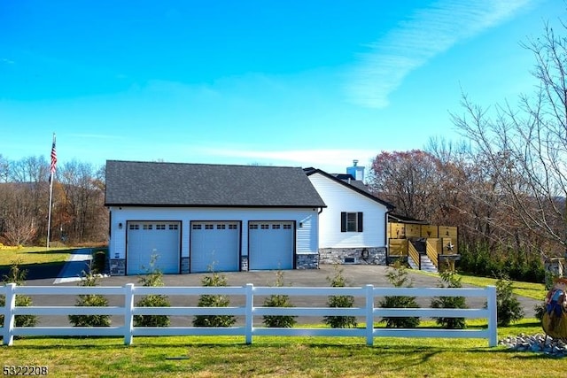 detached garage with fence