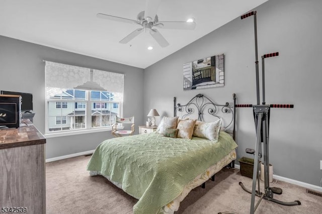 carpeted bedroom featuring lofted ceiling, recessed lighting, visible vents, and baseboards