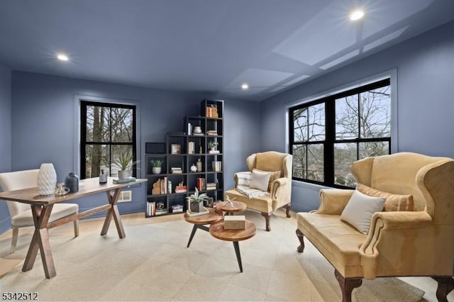 sitting room featuring recessed lighting and plenty of natural light