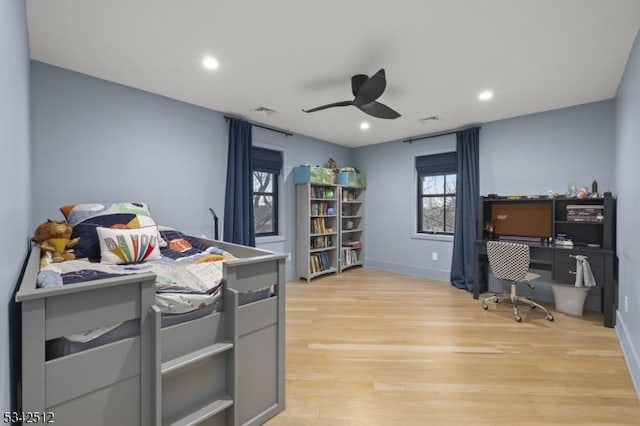 bedroom with visible vents, ceiling fan, light wood-style flooring, and recessed lighting