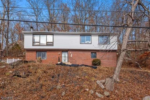 view of front of home with brick siding