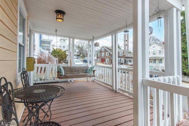 sunroom / solarium with a residential view