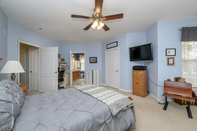 bedroom featuring light carpet, multiple windows, baseboards, and ceiling fan