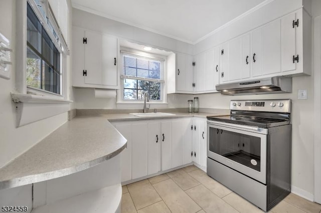 kitchen with white cabinets, stainless steel electric range oven, light countertops, under cabinet range hood, and a sink