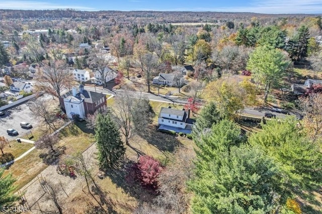 bird's eye view featuring a view of trees