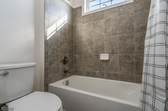 full bathroom with toilet and shower / tub combo with curtain