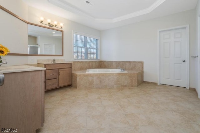 full bath with a raised ceiling, ornamental molding, vanity, a shower stall, and a bath