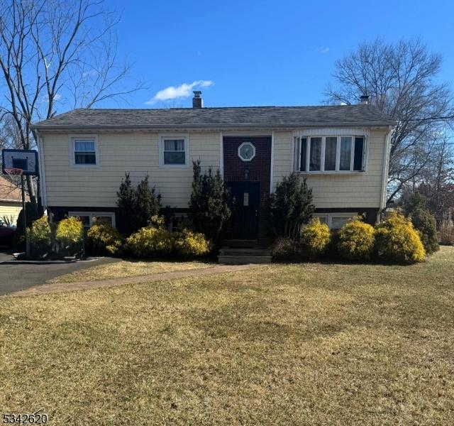 57 Walnut Ave, Bridgewater Twp, NJ 08807 - raised ranch featuring a front lawn