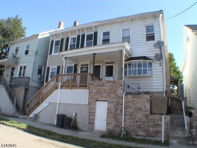 view of front of house featuring stairs