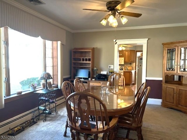 dining area with ceiling fan, visible vents, ornamental molding, and carpet flooring