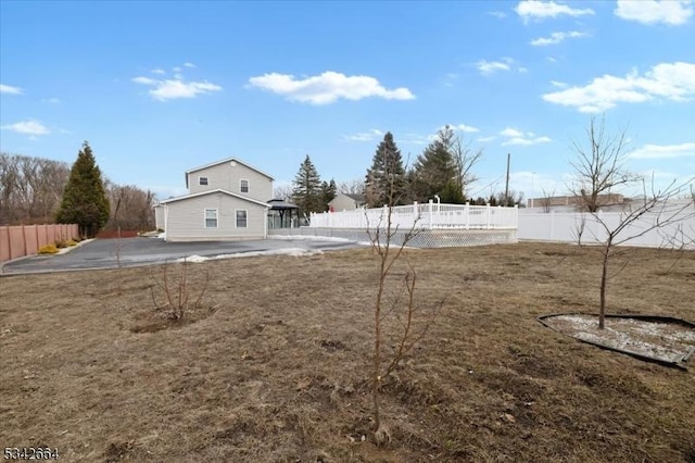 view of yard featuring a fenced backyard and a patio