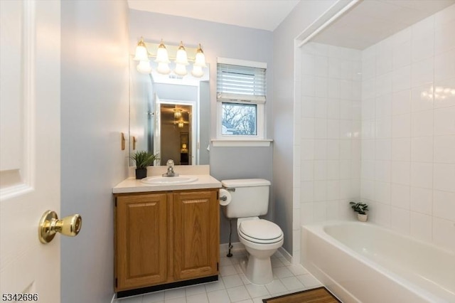 full bath featuring shower / bathing tub combination, toilet, vanity, tile patterned flooring, and baseboards