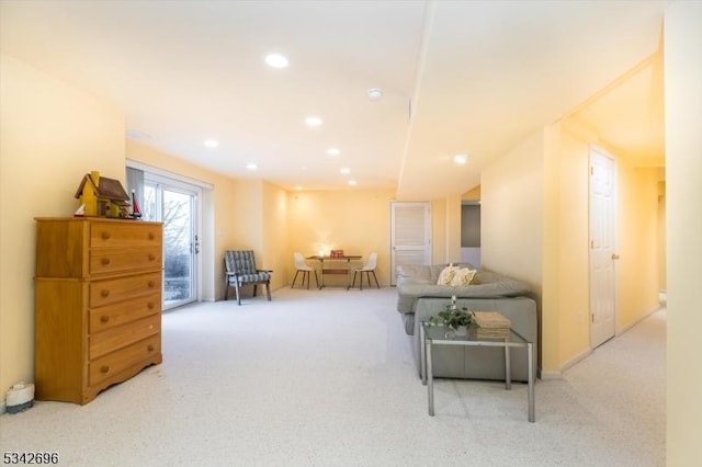 living room with carpet floors and recessed lighting