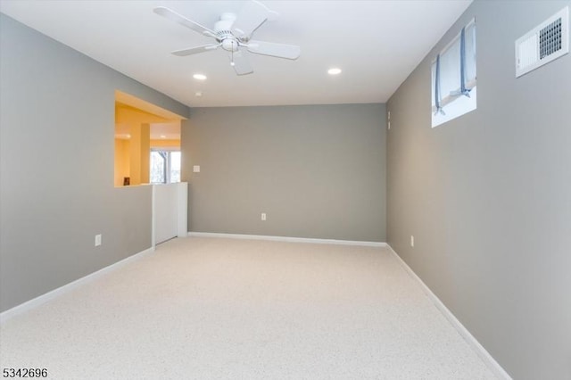 empty room with light carpet, baseboards, visible vents, ceiling fan, and recessed lighting