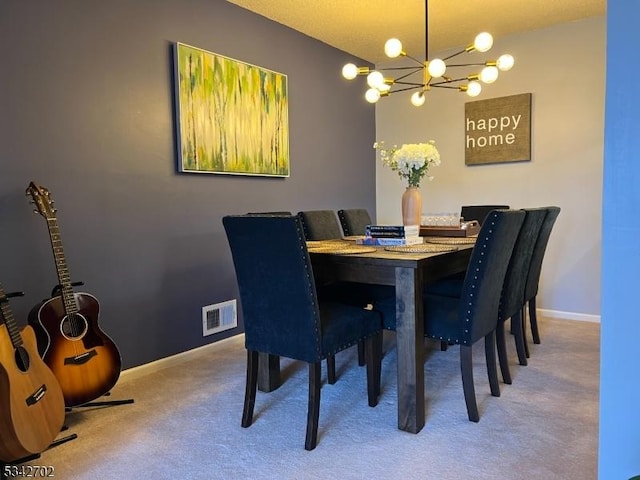 carpeted dining area with visible vents and baseboards