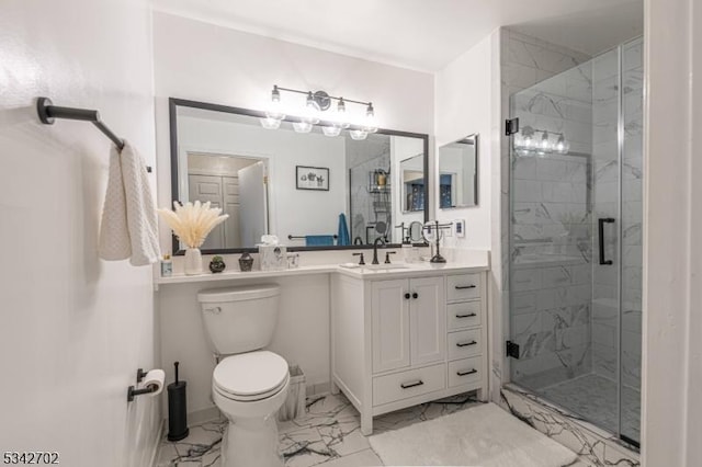 full bath featuring toilet, marble finish floor, a stall shower, and vanity