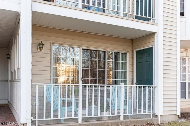 property entrance with a balcony