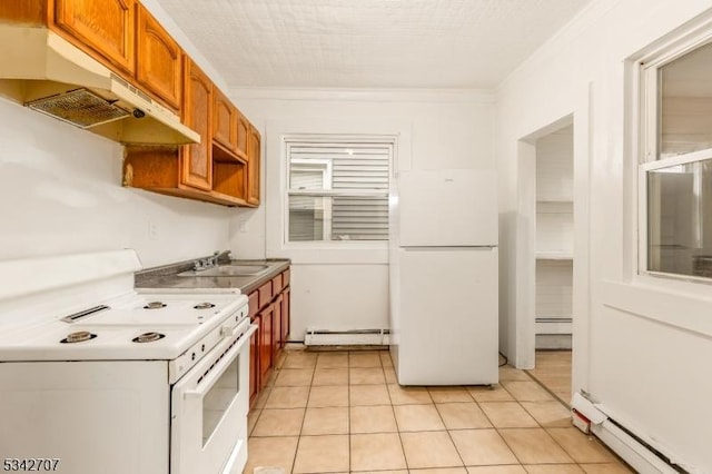 kitchen with under cabinet range hood, white appliances, baseboard heating, and brown cabinetry