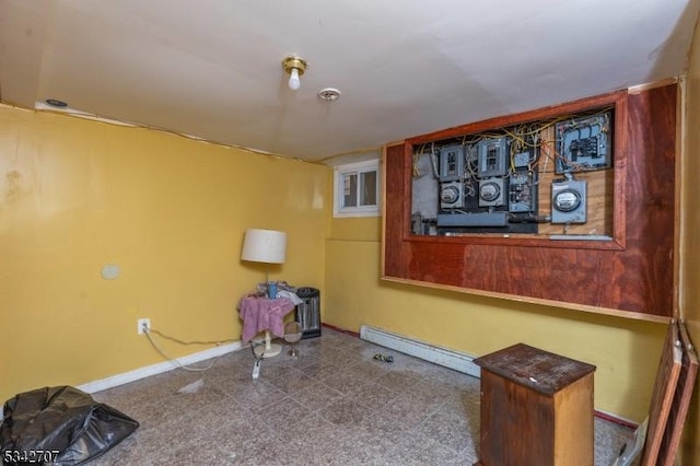 interior space featuring baseboards and a baseboard radiator