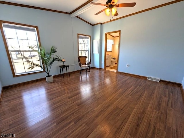 unfurnished room with vaulted ceiling with beams, dark wood finished floors, crown molding, visible vents, and baseboards