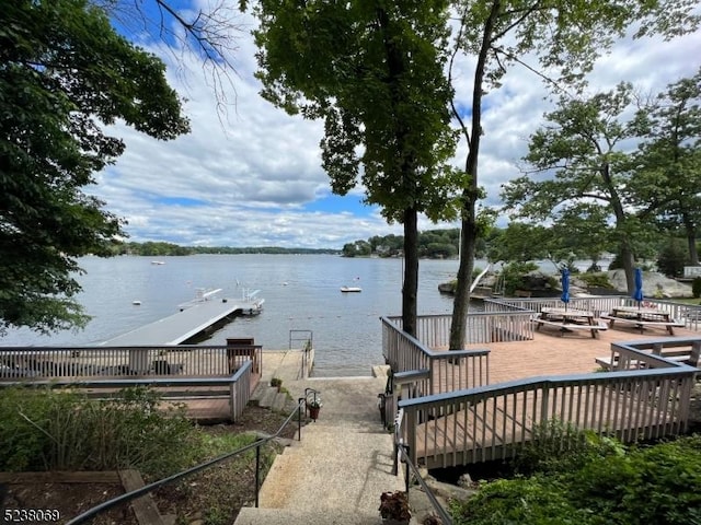 dock area featuring a water view