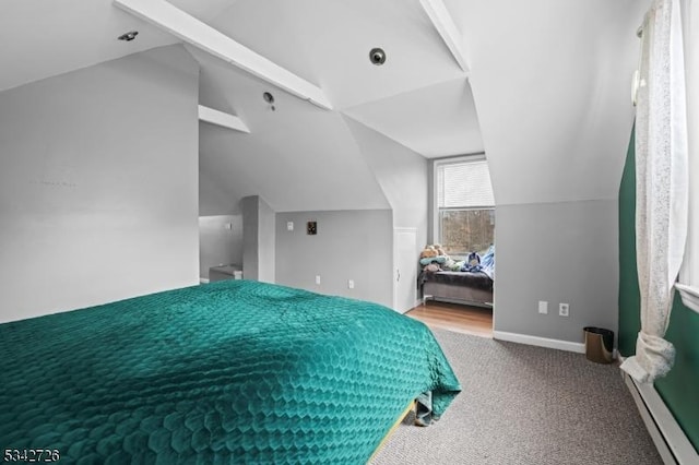 unfurnished bedroom featuring lofted ceiling, carpet floors, and baseboards