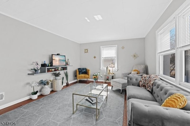 living area featuring wood finished floors and baseboards