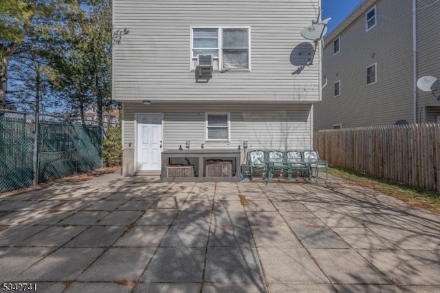 view of patio featuring fence