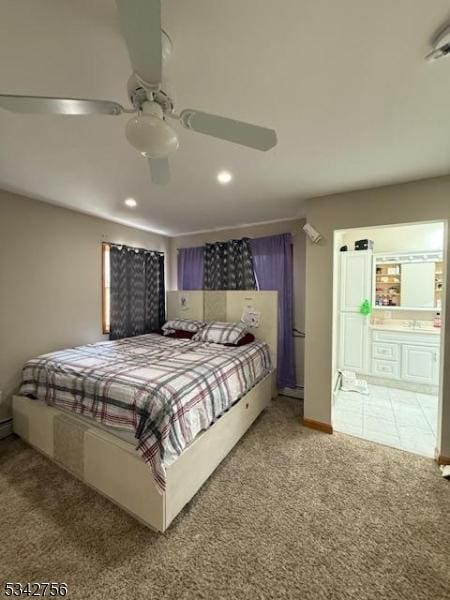 bedroom with carpet flooring, recessed lighting, ensuite bath, and a ceiling fan