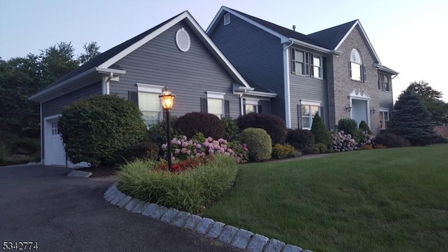 view of front of home featuring a front lawn