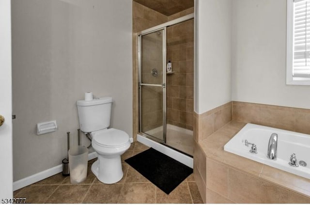 full bathroom with a garden tub, a stall shower, tile patterned flooring, and toilet