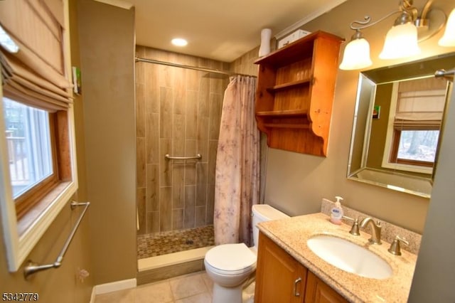 bathroom with tile patterned flooring, toilet, recessed lighting, tiled shower, and vanity