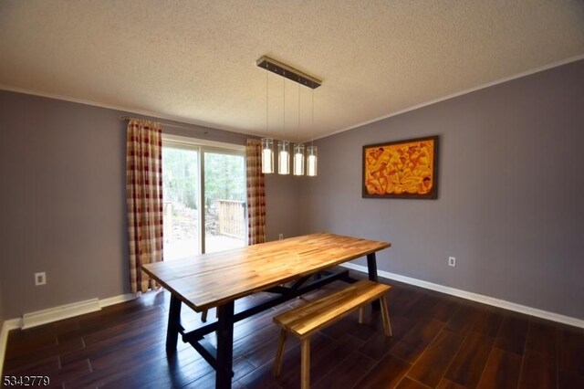 unfurnished dining area with crown molding, baseboards, dark wood-style flooring, and a textured ceiling