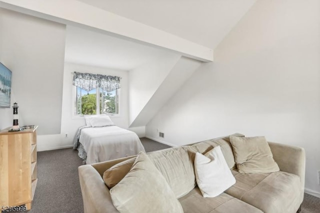 carpeted bedroom featuring baseboards and vaulted ceiling with beams