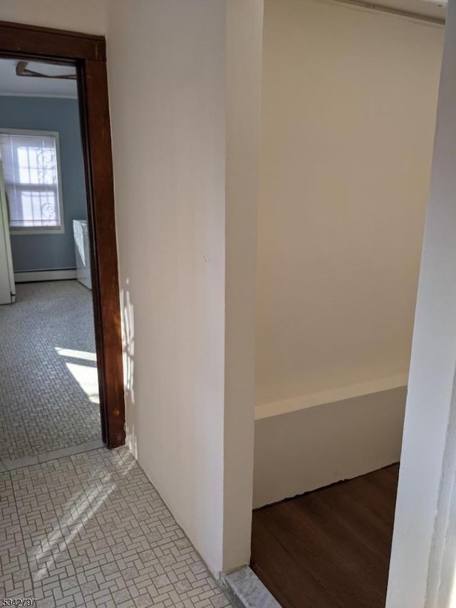 hallway featuring a baseboard radiator