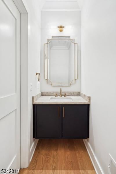 28 Old Forge Dr, Warren Twp, NJ 07059 - bathroom featuring wood finished floors, vanity, and baseboards