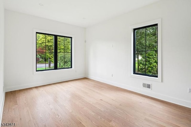 28 Old Forge Dr, Warren Twp, NJ 07059 - empty room featuring healthy amount of natural light, wood finished floors, and baseboards