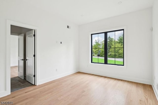 28 Old Forge Dr, Warren Twp, NJ 07059 - unfurnished room with light wood-type flooring and baseboards