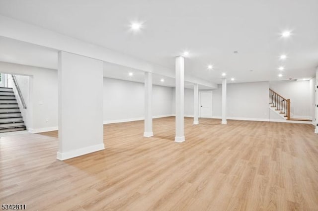28 Old Forge Dr, Warren Twp, NJ 07059 - below grade area with stairway, light wood-style flooring, recessed lighting, and baseboards