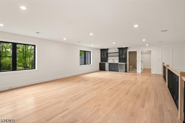 28 Old Forge Dr, Warren Twp, NJ 07059 - unfurnished living room featuring light wood-style flooring, baseboards, and recessed lighting