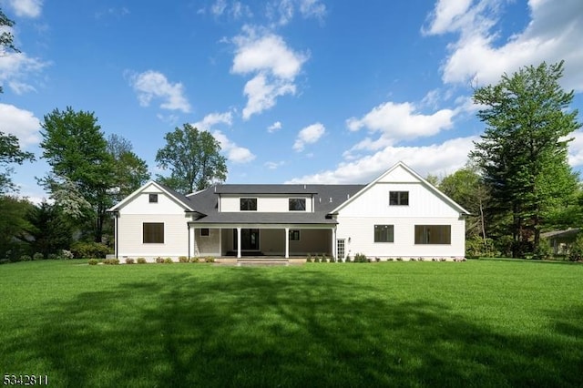 28 Old Forge Dr, Warren Twp, NJ 07059 - rear view of house featuring a lawn and board and batten siding