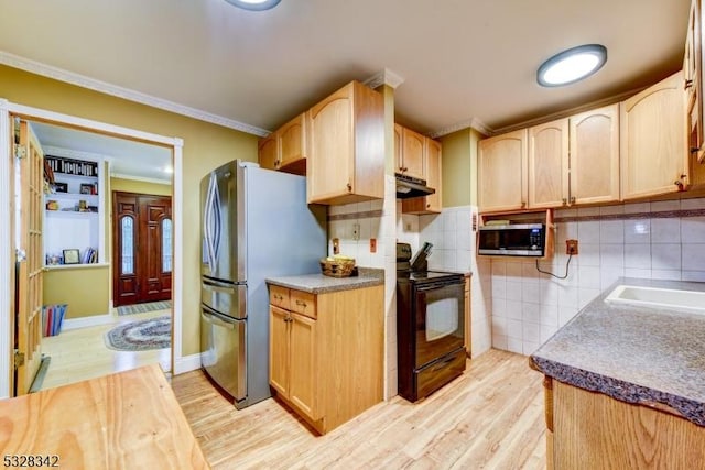 kitchen featuring ornamental molding, appliances with stainless steel finishes, light wood-type flooring, and light brown cabinets