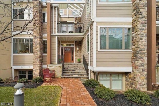 doorway to property with a balcony