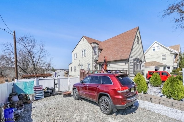 view of property exterior with fence