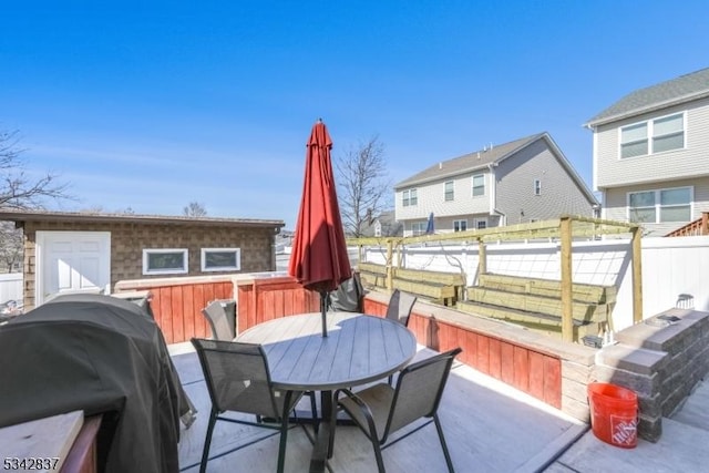 view of patio / terrace featuring outdoor dining area and grilling area