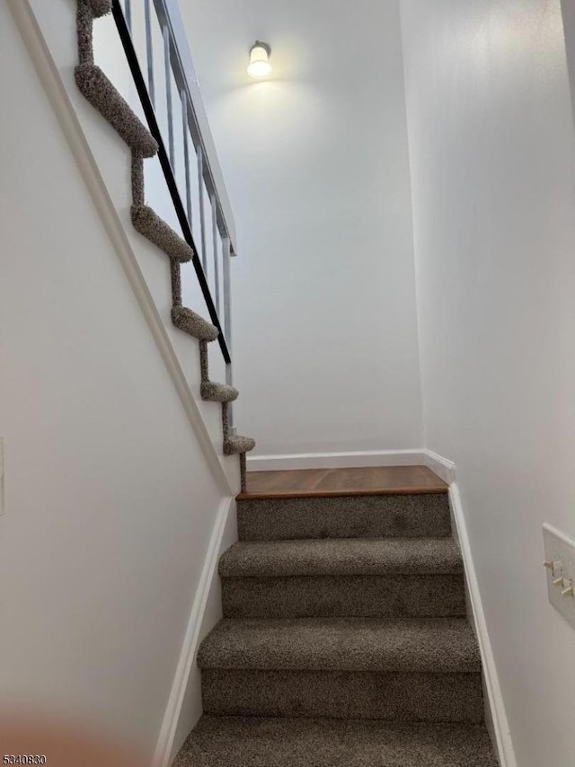 stairway with baseboards